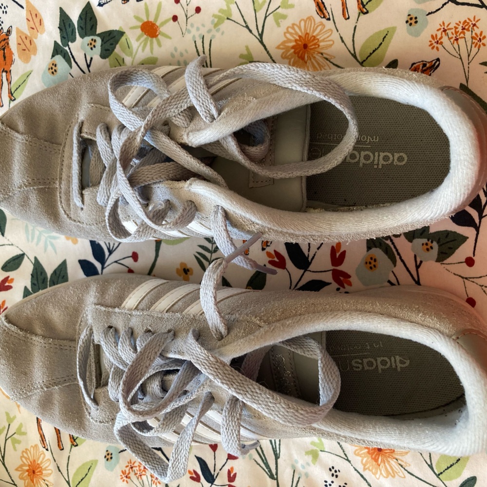 Used gray and white shoes.